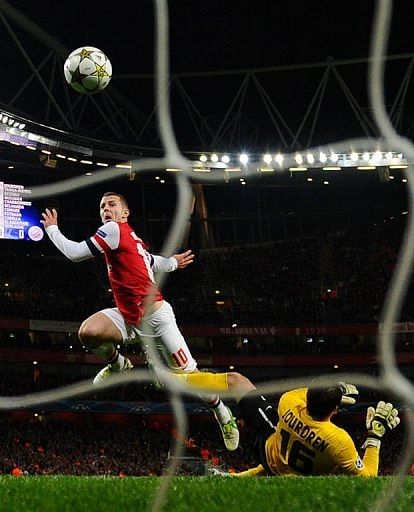 Arsenal's Jack Wilshere scores his team's first goal